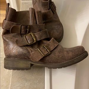 Steve Madden distresses leather combat booties